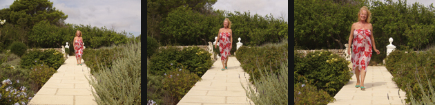 Renate Holthaus geht durch Ihren Garten auf Menorca